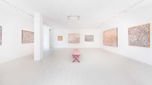 Interior gallery view with Kittey Marlarvie paintings