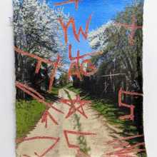 Acrylic painting on unstretched flax of a footpath surrounded by grass and trees, with a blue clear sky above. Red graffiti marks are etched into the painting.