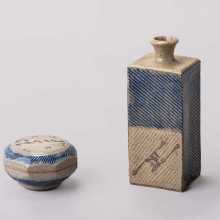 William Plumptre, Lidded Box, thrown and cut sided with inlaid colbalt slip, iron decoration and wood ash glaze, 2020. Press Moulded Square Bottle, inlaid colbalt slip, iron decoration and wood ash glaze, 2020. Photo by Mark Woods.