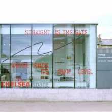 CHELSEA space exterior view with window text by Lawrence Weiner from the exhibition TURTLE, 2006